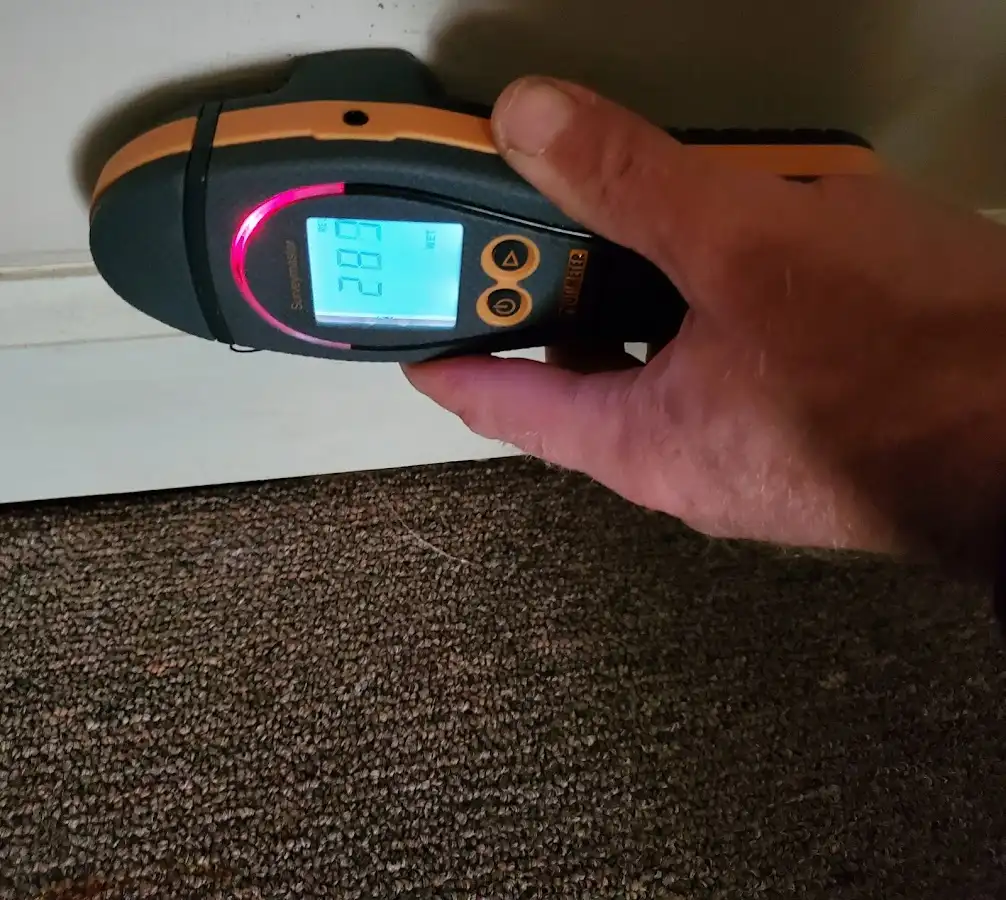 Moisture detection at baseboard during Sewage Cleanup & Sanitation in Vinings